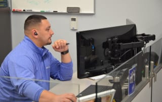 DataServ Team Member working on computer